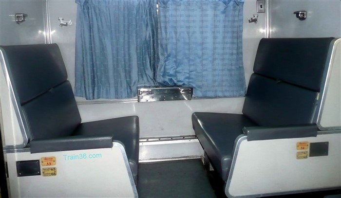 2nd Class seats in an air-conditioned carriage on a train from Hat Yai to Hua Hin