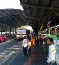 The bus stop besides platform 12 with bus number 7 to Chinatown and little India