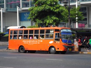 orange non air-con minibus in bangkok