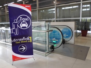 sign to the taxi stand on the 1st floor