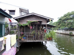 Picture of a wooden house by the canal Picture of a wooden house by the canal