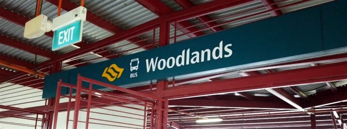 Woodlands bus sign